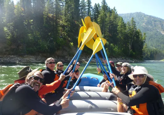 Backroads guests smiling while white water rafting