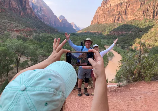 Guests getting photo taken in Zion