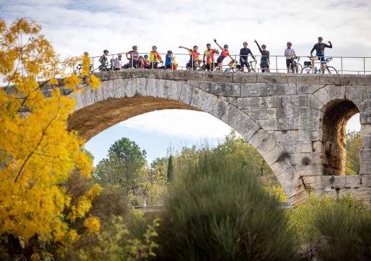 Backroads Guests Posing on Top of Bridge