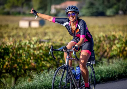 Backroads Guest Biking with One Arm Out