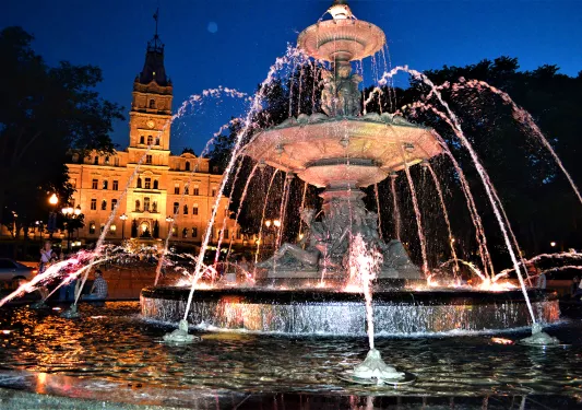 Large fountain instillation at night.