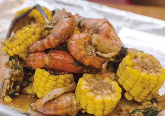 Close-up of shrimp boil ingredients.