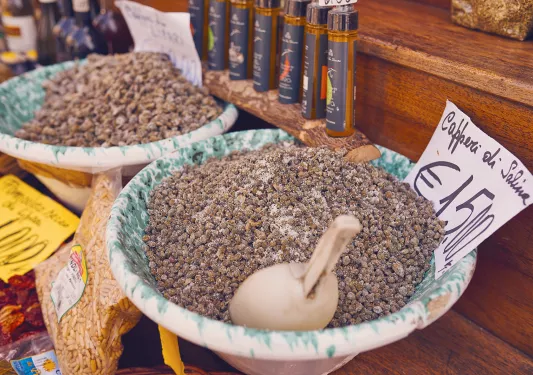 Shot of mound of salted almonds.