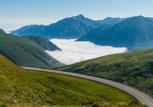 Scenic road leading through Pyrenees Mountains, France.