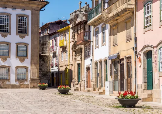 Shot of town square, alleyway, housefronts, doorways, windows, etc.