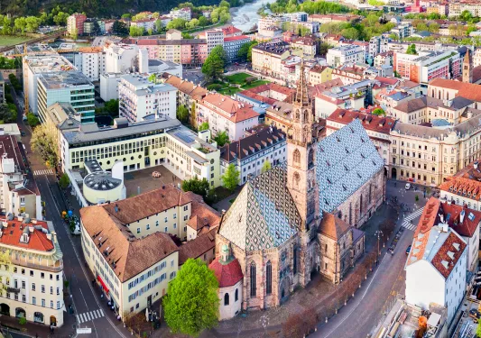 Wide shot of Bolzano Cathedral and it's surrounding town.
