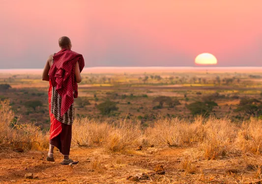 Masai looking at the sunset in Tanzania