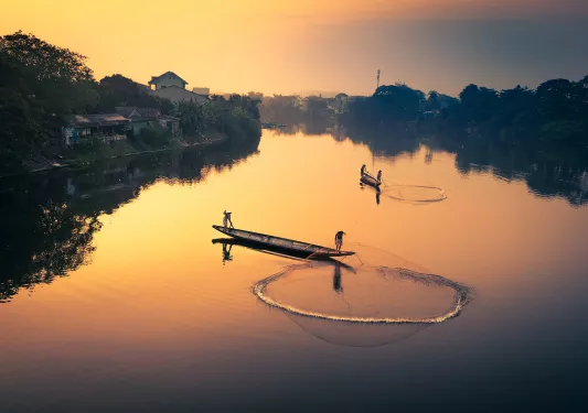 Fishermen in Vietnam at sunet