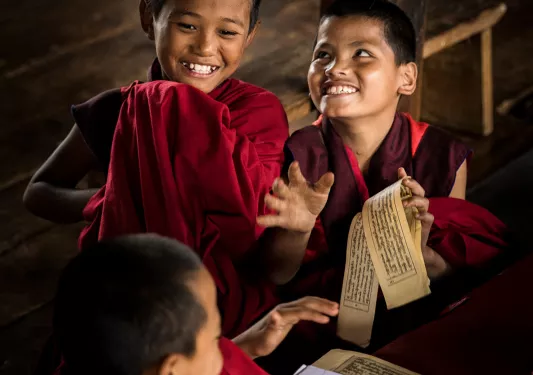 Laughing young monks in Bhutan