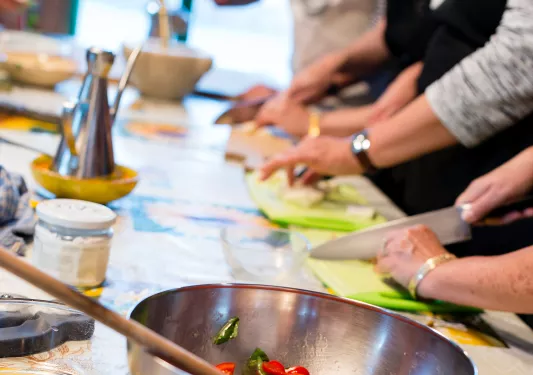 Close-up of guests at cooking class.