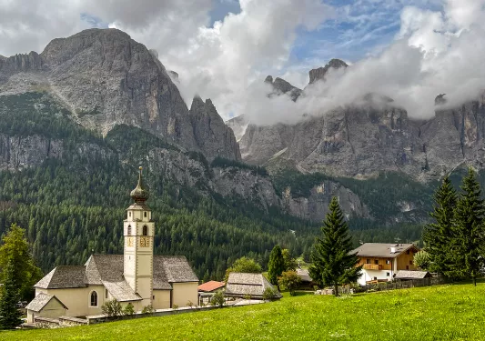 Shot of the Church of Colfosco and it's surrounding village.