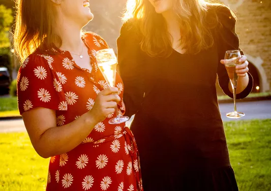 Two backroads guests framed by sunset light.