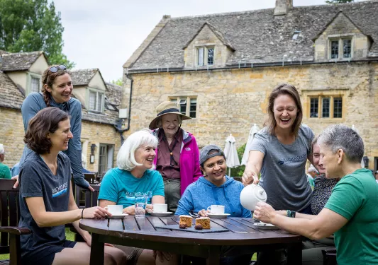 Eight Backroads guests enjoying English tea.