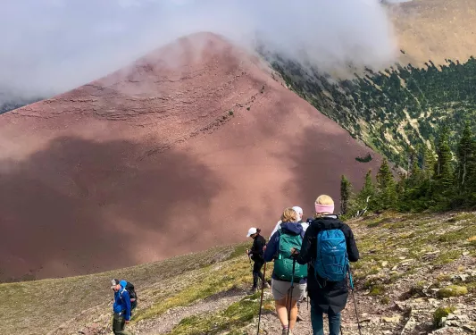 Backroads guest hiking through mountains