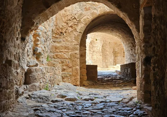 POV shot of ancient stone alleyways.