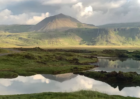 Mountain and it's reflection in lake, Iceland.