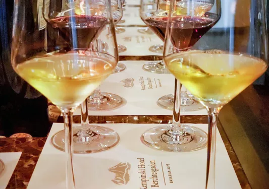 Flight of white and red wine in glasses.