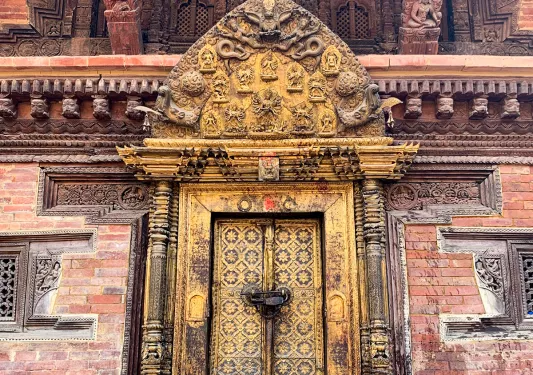 Ancient and ornate gate and door in Nepal
