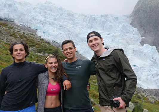 Group of four teenagers hiking in Norway
