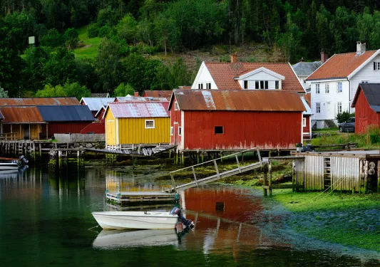 Colorful houses in Norway along the banks of a fjord