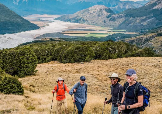 Hiking through a field in New Zealand