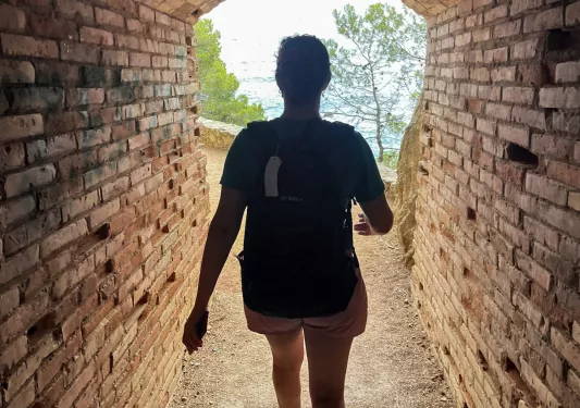 Backroads Guest Walking Through Tunnel