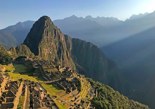 Wide shot of Machu Picchu during sunset.