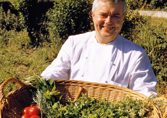 Tomatoes and Greens in Basket