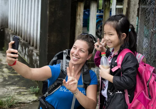 Backroads Guest Taking Selfie with Little Girl