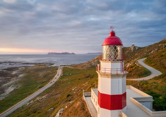 lighthouse looking out over the water