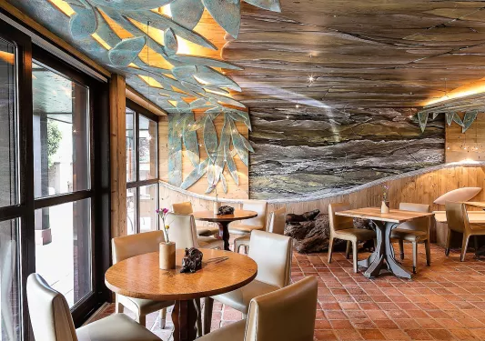 hotel dining room with decorated ceilings 