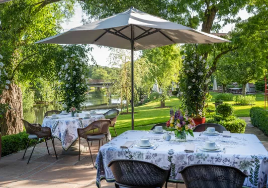 table under umbrella in the yard