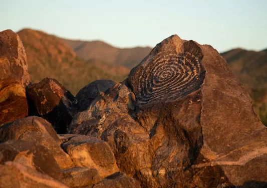 Jagged rocks with designs painted on them