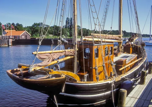 Small ship docked at a port 