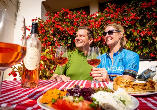 man and women drinking wine