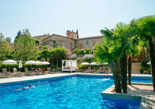 pool with lounge chairs