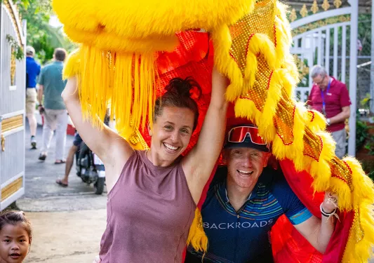 backroads guests with a dragon headress