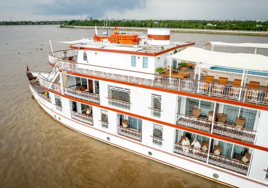 A boat gliding along a river