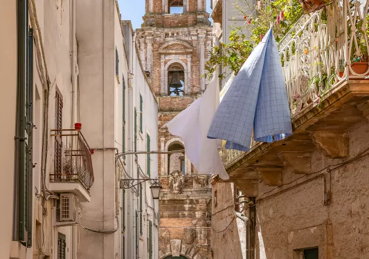 Alleyway between rustic, brick buildings
