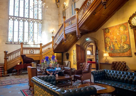 Grand hotel lobby with leather couches