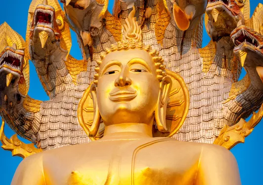 Golden shrine statue with a snake with 7 heads