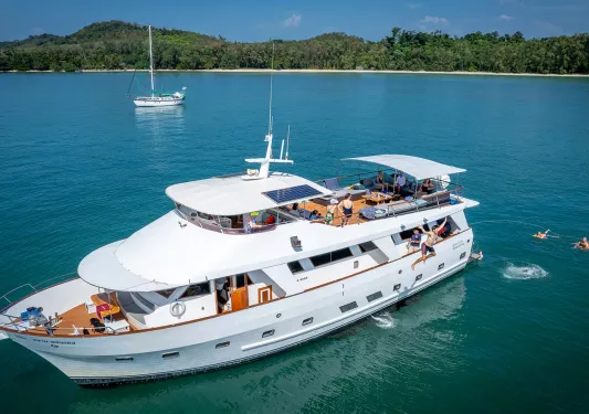 People jumping off yacht