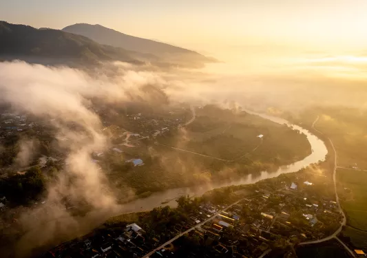 Fog rising over a city