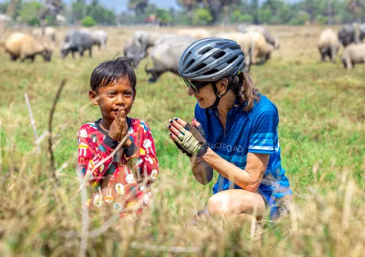 a woman and child praying