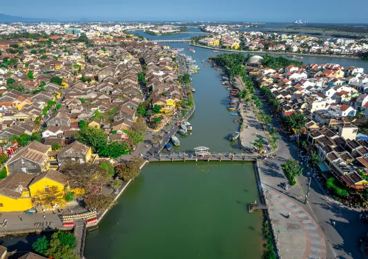 Aerial view of a city with a river running through it