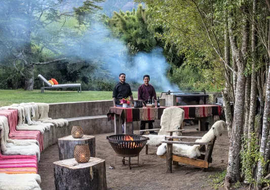 chefs at an outdoor barbeque 
