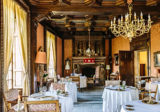 rustic dining area with fireplace