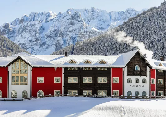 colorful hotel covered in snow