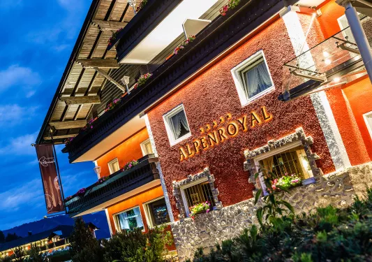 Closeup of the Alpenroyal hotel at sundown
