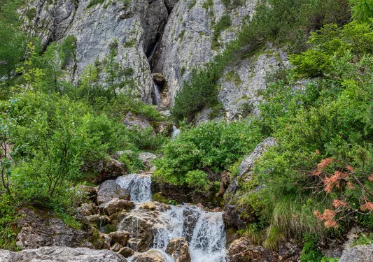 A waterfall between steep rocks